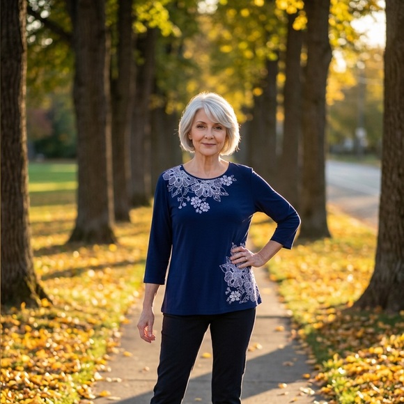 Alfred Dunner navy blue top featuring prominent white floral embroidery - Picture 2 of 10